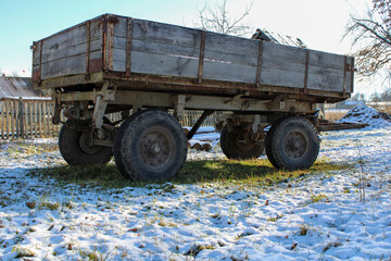 An old tractor trailer in the snow