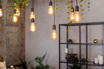 Restaurant decoration with edison bulbs.Retro style light bulbs .Electric lamp hanging from the...