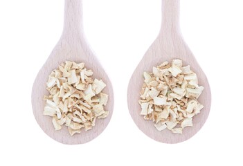 Celery (Apium graveolens) dried slices in wooden spoons