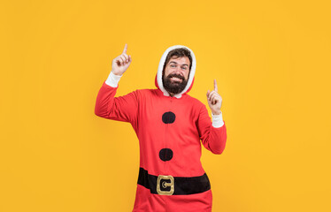 happy bearded man in santa claus costume celebrate winter holiday of chistmas and feel merry about xmas gifts, xmas party
