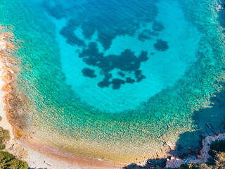 Aerial drone top down shot of beautiful sea. Turquoise sea landscape. Summer holiday background view.