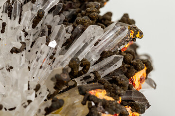 Macro of Realgar mineral stone on white background