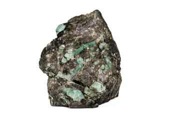 Macro emerald stone mineral in rock on white background