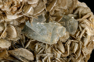 Macro stone Topaz mineral on a black background