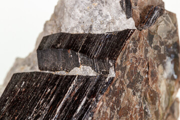 Macro of a mineral stone Vesuvianite on a white background