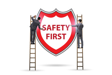 Safety first concept with businessman