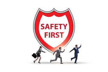 Safety first badge with business people