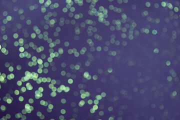 abstract vivid bokeh circles in soft color style background,free Space for text input. purple background with bokeh