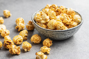 Sweet caramel popcorn in bowl.