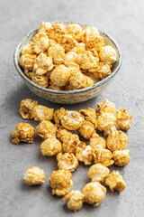 Sweet caramel popcorn in bowl.