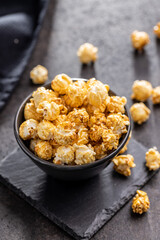 Sweet caramel popcorn in bowl.
