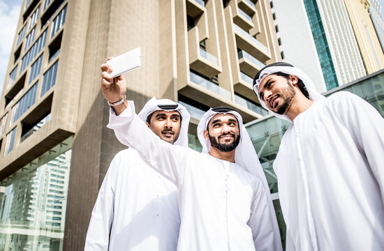 Three arabic business men spending time in Dubai