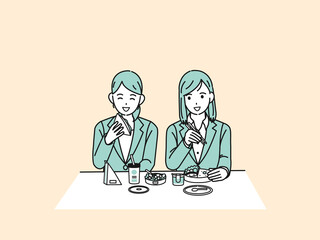 ランチを食べる　お昼ご飯　休憩　女性会社員　ビジネスウーマン　同僚　お弁当