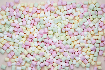 small pastel colored marshmallows as image background