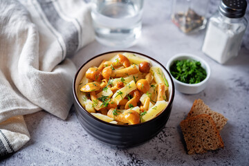 Roasted potato with mushrooms in a bowl