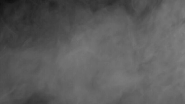 Smoke Screen is Slowly Melting. A curtain of white smoke slowly settles revealing a black screen