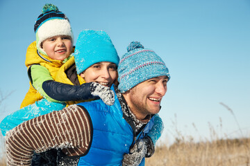 portrait of a happy happy family in the winter - 472500605