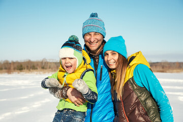 portrait of a happy happy family in the winter - 472500608