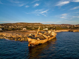 Cyprus - Abandoned shipwreck EDRO III in Pegeia, Paphos, Cyprus from drone view at amazing sunset...