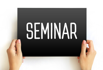 SEMINAR text on card, concept background