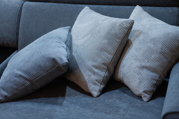 stylish cozy home sofa with three pillows