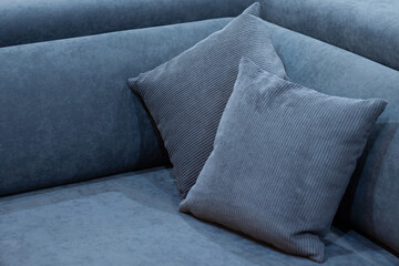 stylish cozy home corner on the sofa with two pillows