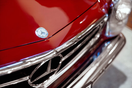 Close up shot of a Mercedes 280 sl red car's emblem which produced between 1968 and 1970. Editorial Shot in Izmir Turkey.