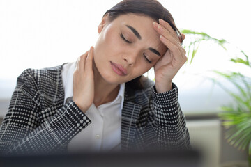 businesswoman have pain  cause working late time