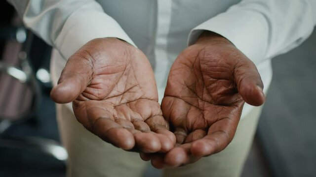 Closeup Shot Of Old African American Man's Hands, Black Male Showing Palms