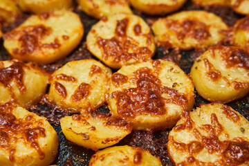 Oven baked potatoes with cheese crust