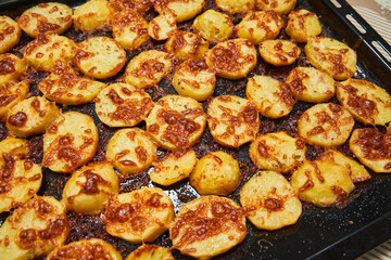 Oven baked potatoes with cheese crust