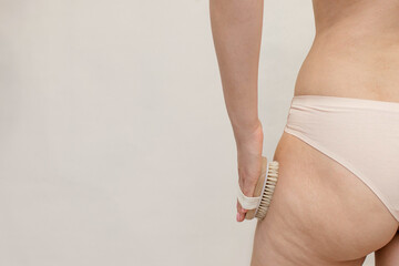 Thick with cellulite thighs and buttocks of a young woman