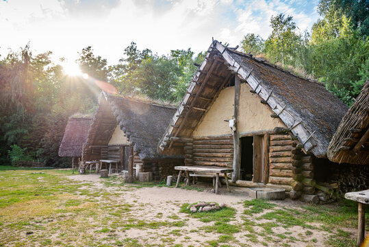 Biskupin, Poland - August 09, 2021. Archaeological site and a life-size model of a late Bronze Age fortified settlement in north-central Poland