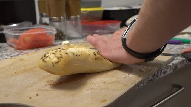 baker kneading dough