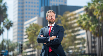 manager executive outside the office. male formal fashion. confident bearded boss.