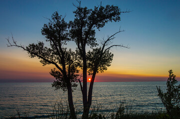 Naklejka na ściany i meble sunset over the Lake Michigan 