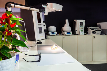 Orthodontist office. Dentist workplace. Orthodontist doctor office empty. Denture on work table. Orthodontist laboratory. Laboratory in a dental clinic. Concept - equipment for a dental clinic