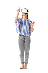 Young blonde woman in VR glasses on white background