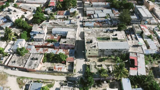 Slums On The Outskirts Of The Capital Of The American Continent. A Residential Area With A Lack Of Normal Housing And Infrastructure. Dirty Buildings On Dirty Streets. Social Inequality.