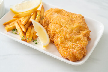 fish and chips - fried fish fillet with potatoes chips