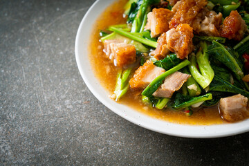 Stir-fried kale vegetable with crispy pork