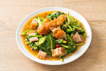Stir-fried kale vegetable with crispy pork