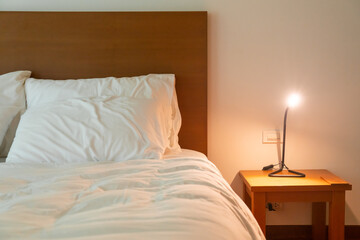 white pillow decoration on bed