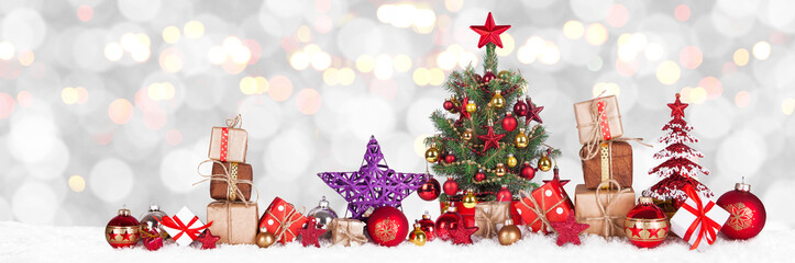 Christmas Tree with decoration on a winter background.