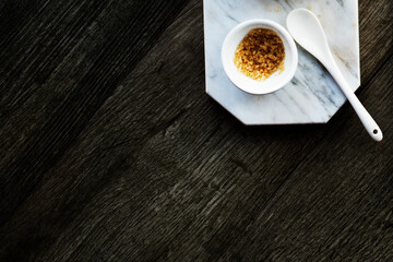 Closeup aerial view of brown sugar on wooden table