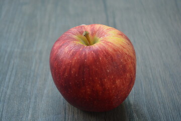 Envy apples are a round variety with striated, ruby red skin with green undertones. They have a crisp, sweet white flesh 