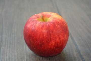 Envy apples are a round variety with striated, ruby red skin with green undertones. They have a crisp, sweet white flesh 