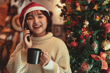 girl use smartphone and enjoy christmas holiday,  new year celebration concept