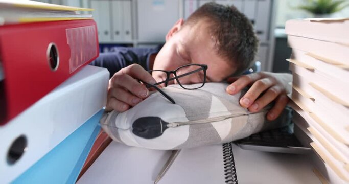 Man sleeping at table with many folders with documents 4k movie slow motion