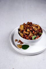Kering tempe or pencok, Sweet and spicy tempeh with potatoes and peanuts, is one of the most delicious Indonesian tempeh dish.
